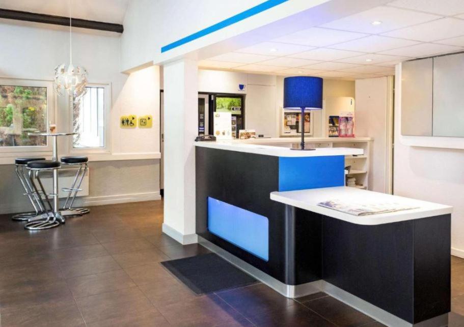 Hotel Ibis Budget Nantes Ouest Atlantis Couëron Exterior foto