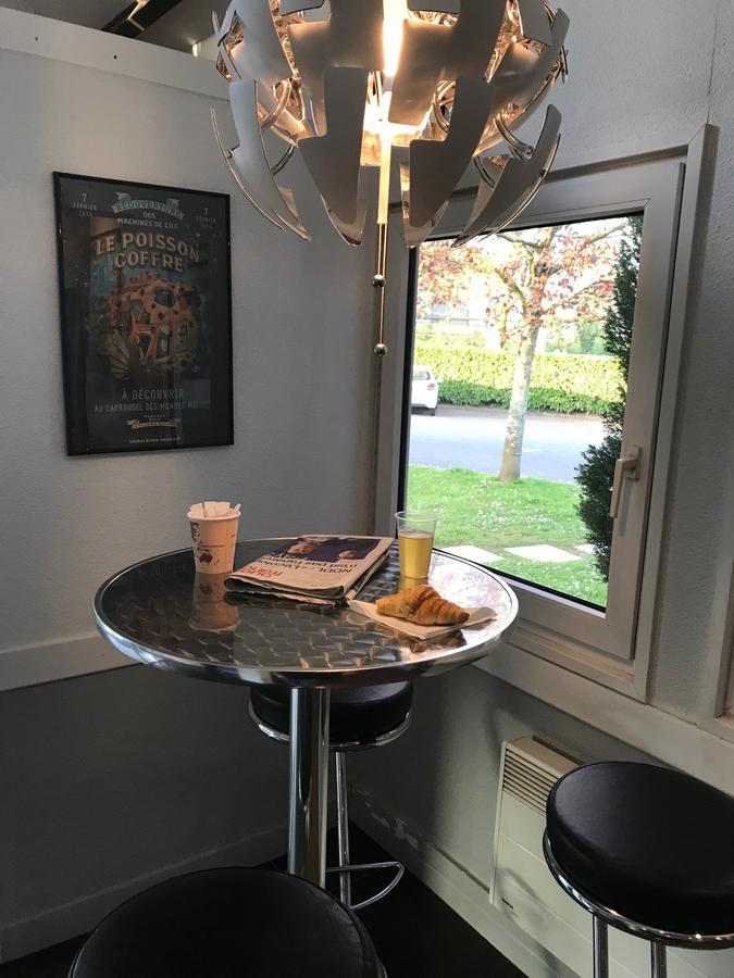 Hotel Ibis Budget Nantes Ouest Atlantis Couëron Exterior foto